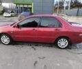 Червоний Міцубісі Lancer, об'ємом двигуна 1.6 л та пробігом 140 тис. км за 6000 $, фото 5 на Automoto.ua