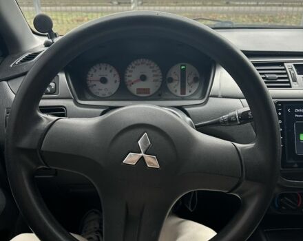Червоний Міцубісі Lancer, об'ємом двигуна 1.6 л та пробігом 224 тис. км за 4300 $, фото 8 на Automoto.ua