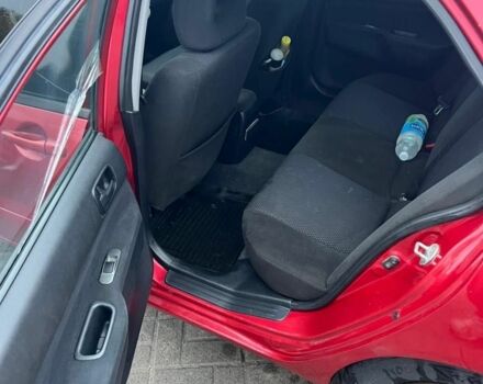 Красный Мицубиси Лансер, объемом двигателя 1.6 л и пробегом 265 тыс. км за 2956 $, фото 4 на Automoto.ua