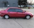 Червоний Міцубісі Lancer, об'ємом двигуна 1.6 л та пробігом 140 тис. км за 6000 $, фото 3 на Automoto.ua