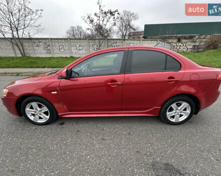 Червоний Міцубісі Lancer, об'ємом двигуна 2 л та пробігом 366 тис. км за 6500 $, фото 3 на Automoto.ua
