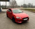 Красный Мицубиси Лансер, объемом двигателя 2 л и пробегом 223 тыс. км за 5800 $, фото 1 на Automoto.ua