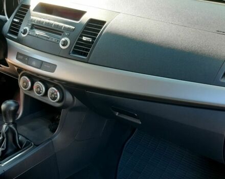 Красный Мицубиси Лансер, объемом двигателя 2 л и пробегом 110 тыс. км за 7500 $, фото 20 на Automoto.ua