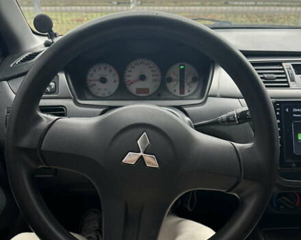 Червоний Міцубісі Lancer, об'ємом двигуна 1.6 л та пробігом 224 тис. км за 4300 $, фото 7 на Automoto.ua