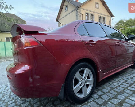 Міцубісі Lancer 2008 у Києві на Automoto.ua Червоний Міцубісі Lancer, об'ємом двигуна 2 л та пробігом 250 тис. км за 7000 $, фото 2 на Automoto.ua