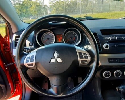 Красный Мицубиси Лансер, объемом двигателя 2 л и пробегом 110 тыс. км за 7500 $, фото 13 на Automoto.ua