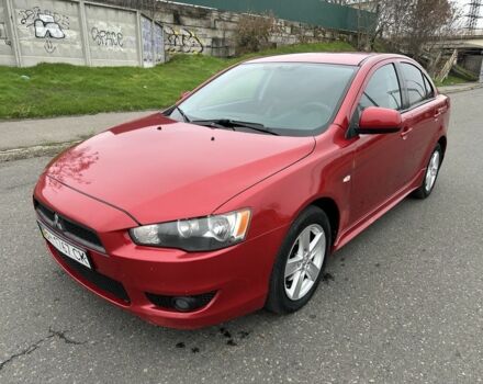 Красный Мицубиси Лансер, объемом двигателя 2 л и пробегом 366 тыс. км за 6500 $, фото 2 на Automoto.ua