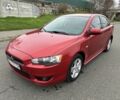 Красный Мицубиси Лансер, объемом двигателя 2 л и пробегом 366 тыс. км за 6500 $, фото 2 на Automoto.ua