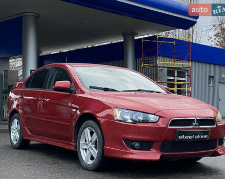 Красный Мицубиси Лансер, объемом двигателя 1.5 л и пробегом 120 тыс. км за 7699 $, фото 2 на Automoto.ua