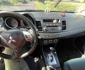 Красный Мицубиси Лансер, объемом двигателя 2 л и пробегом 240 тыс. км за 5700 $, фото 6 на Automoto.ua