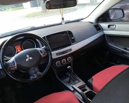 Червоний Міцубісі Lancer, об'ємом двигуна 2 л та пробігом 300 тис. км за 3700 $, фото 3 на Automoto.ua