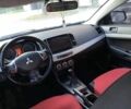 Червоний Міцубісі Lancer, об'ємом двигуна 2 л та пробігом 300 тис. км за 3700 $, фото 3 на Automoto.ua