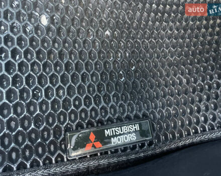 Червоний Міцубісі Lancer, об'ємом двигуна 2 л та пробігом 179 тис. км за 6499 $, фото 13 на Automoto.ua