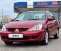 Червоний Міцубісі Lancer, об'ємом двигуна 1.58 л та пробігом 223 тис. км за 6400 $, фото 6 на Automoto.ua
