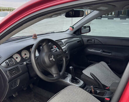Красный Мицубиси Лансер, объемом двигателя 1.6 л и пробегом 276 тыс. км за 4550 $, фото 11 на Automoto.ua