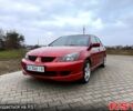 Красный Мицубиси Лансер, объемом двигателя 1.6 л и пробегом 175 тыс. км за 5300 $, фото 1 на Automoto.ua