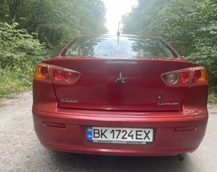Красный Мицубиси Лансер, объемом двигателя 1.5 л и пробегом 124 тыс. км за 6300 $, фото 5 на Automoto.ua