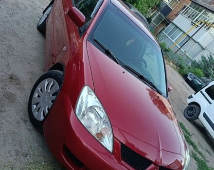 Червоний Міцубісі Lancer, об'ємом двигуна 1.6 л та пробігом 227 тис. км за 5300 $, фото 5 на Automoto.ua
