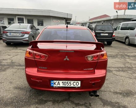 Красный Мицубиси Лансер, объемом двигателя 2 л и пробегом 330 тыс. км за 5250 $, фото 10 на Automoto.ua