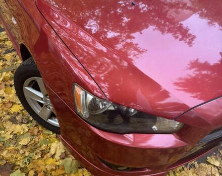 Червоний Міцубісі Lancer, об'ємом двигуна 2 л та пробігом 203 тис. км за 8000 $, фото 9 на Automoto.ua