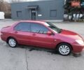 Червоний Міцубісі Lancer, об'ємом двигуна 1.58 л та пробігом 140 тис. км за 6000 $, фото 22 на Automoto.ua