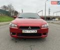 Червоний Міцубісі Lancer, об'ємом двигуна 2 л та пробігом 366 тис. км за 6500 $, фото 19 на Automoto.ua