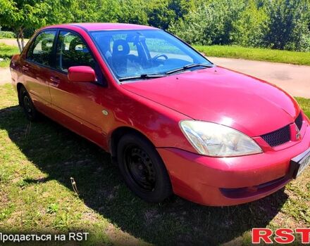 Красный Мицубиси Лансер, объемом двигателя 1.6 л и пробегом 140 тыс. км за 5500 $, фото 3 на Automoto.ua