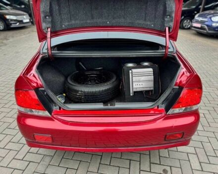 Красный Мицубиси Лансер, объемом двигателя 1.6 л и пробегом 215 тыс. км за 4500 $, фото 8 на Automoto.ua