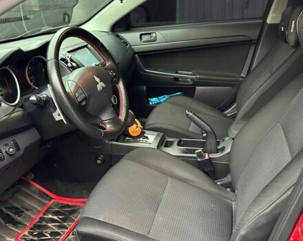 Червоний Міцубісі Lancer, об'ємом двигуна 2 л та пробігом 137 тис. км за 8500 $, фото 7 на Automoto.ua