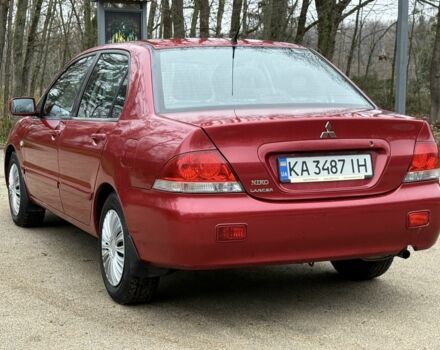 Червоний Міцубісі Lancer, об'ємом двигуна 1.6 л та пробігом 220 тис. км за 4600 $, фото 5 на Automoto.ua