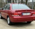 Червоний Міцубісі Lancer, об'ємом двигуна 1.6 л та пробігом 220 тис. км за 4600 $, фото 5 на Automoto.ua