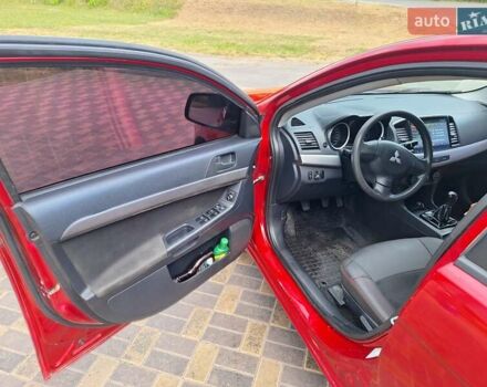 Красный Мицубиси Лансер, объемом двигателя 1.5 л и пробегом 227 тыс. км за 6700 $, фото 4 на Automoto.ua