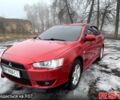 Червоний Міцубісі Lancer, об'ємом двигуна 2 л та пробігом 260 тис. км за 6400 $, фото 1 на Automoto.ua