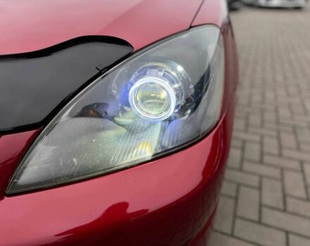 Красный Мицубиси Лансер, объемом двигателя 1.6 л и пробегом 215 тыс. км за 4500 $, фото 1 на Automoto.ua