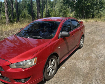 Червоний Міцубісі Lancer, об'ємом двигуна 2 л та пробігом 230 тис. км за 5800 $, фото 1 на Automoto.ua