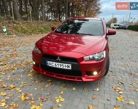 Красный Мицубиси Лансер, объемом двигателя 2 л и пробегом 197 тыс. км за 6500 $, фото 14 на Automoto.ua