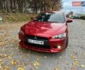 Красный Мицубиси Лансер, объемом двигателя 2 л и пробегом 197 тыс. км за 6500 $, фото 14 на Automoto.ua