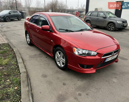 Красный Мицубиси Лансер, объемом двигателя 2 л и пробегом 330 тыс. км за 5250 $, фото 3 на Automoto.ua