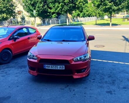 Червоний Міцубісі Lancer, об'ємом двигуна 2 л та пробігом 172 тис. км за 7000 $, фото 4 на Automoto.ua