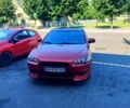 Червоний Міцубісі Lancer, об'ємом двигуна 2 л та пробігом 172 тис. км за 7000 $, фото 4 на Automoto.ua