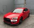 Червоний Міцубісі Lancer, об'ємом двигуна 2 л та пробігом 137 тис. км за 8500 $, фото 2 на Automoto.ua