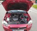 Красный Мицубиси Лансер, объемом двигателя 1.5 л и пробегом 210 тыс. км за 5799 $, фото 22 на Automoto.ua