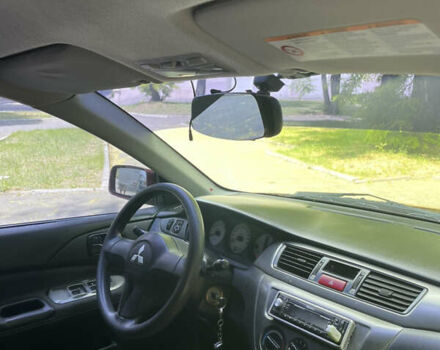 Червоний Міцубісі Lancer, об'ємом двигуна 1.6 л та пробігом 270 тис. км за 5699 $, фото 56 на Automoto.ua