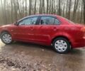 Червоний Міцубісі Lancer, об'ємом двигуна 0 л та пробігом 124 тис. км за 7555 $, фото 4 на Automoto.ua