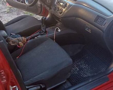 Мицубиси Лансер 2008 в Львове на Automoto.ua Красный Мицубиси Лансер, объемом двигателя 1.58 л и пробегом 280 тыс. км за 3200 $, фото 6 на Automoto.ua