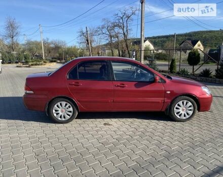 Червоний Міцубісі Lancer, об'ємом двигуна 0 л та пробігом 160 тис. км за 4244 $, фото 31 на Automoto.ua