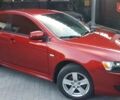 Червоний Міцубісі Lancer, об'ємом двигуна 2 л та пробігом 141 тис. км за 7600 $, фото 3 на Automoto.ua