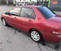 Червоний Міцубісі Lancer, об'ємом двигуна 1.58 л та пробігом 140 тис. км за 6000 $, фото 8 на Automoto.ua