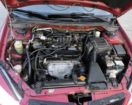 Червоний Міцубісі Lancer, об'ємом двигуна 1.6 л та пробігом 140 тис. км за 6000 $, фото 21 на Automoto.ua