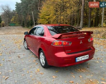 Красный Мицубиси Лансер, объемом двигателя 2 л и пробегом 197 тыс. км за 6500 $, фото 11 на Automoto.ua